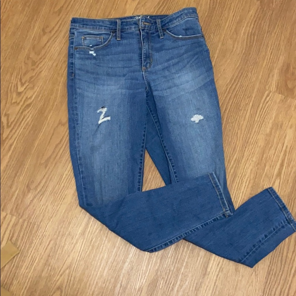 Ripped denim boot cut jeans